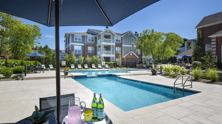 Resort-Inspired Pool with Sundeck and Lounge Seating