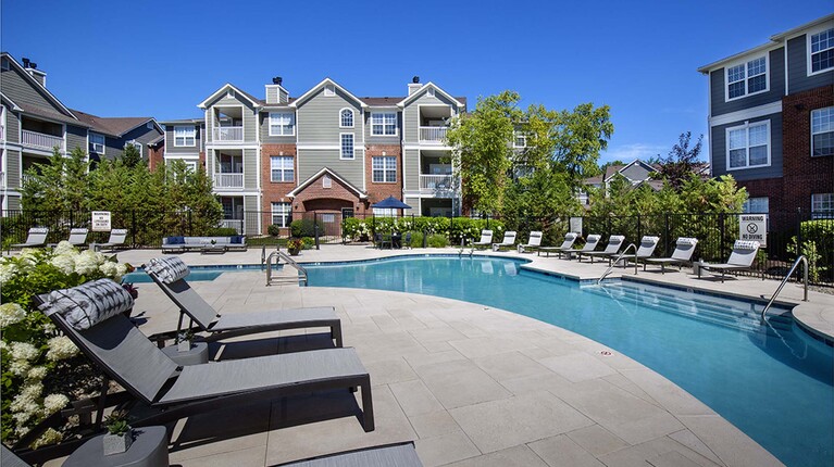 Resort-Inspired Pool with Sundeck and Lounge Seating