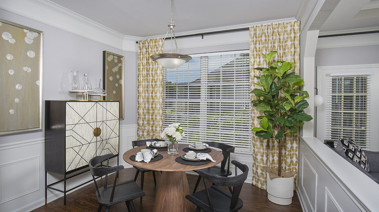 Dining Area with Crown Molding and Judges Panels